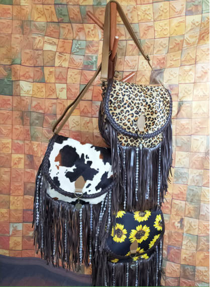 Sultry Sophistication: Leopard Print Tassel Bag with Alluring Vintage Vibes and Plush Accents