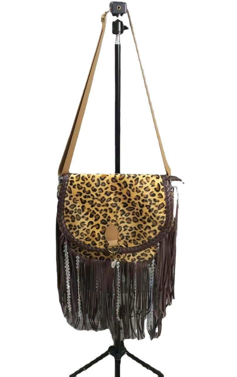 Sultry Sophistication: Leopard Print Tassel Bag with Alluring Vintage Vibes and Plush Accents