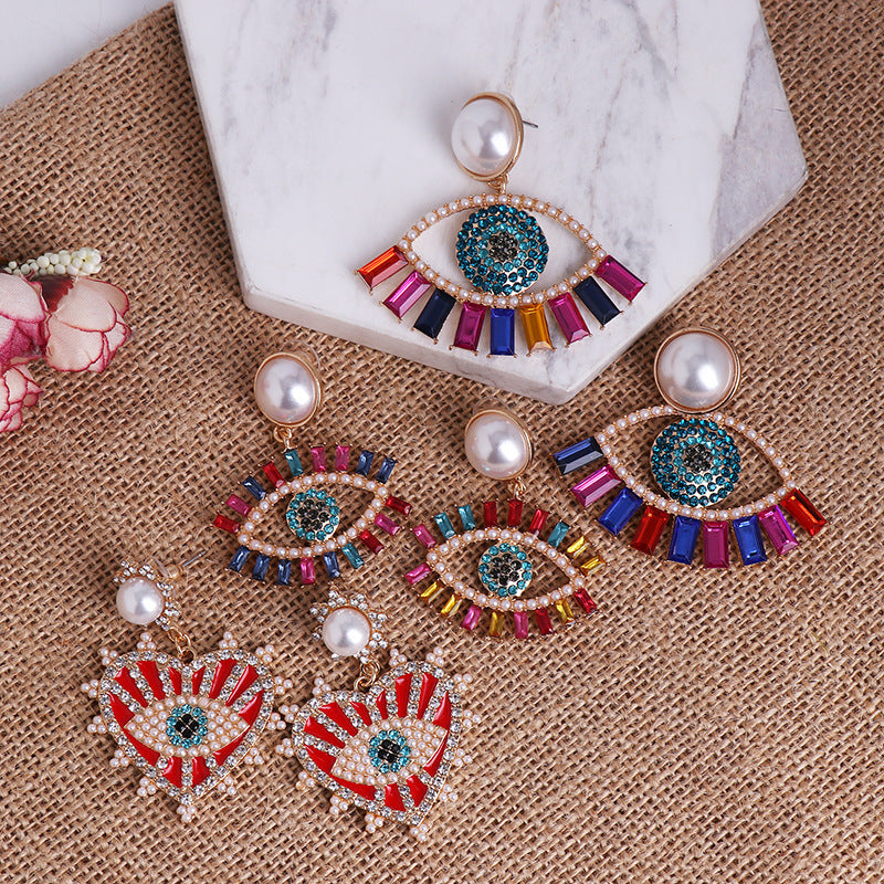 Diamond-Studded Angel Eye Earrings: A Fusion of Korean Trend and French Chic